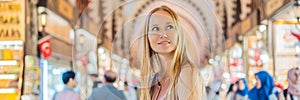 BANNER, LONG FORMAT A tourist woman walks among the countless shops at the Grand Bazaar and Egyptian Bazaar in Istanbul