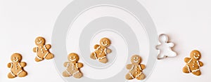 Banner made of Homemade gingerbread cookies on white background. Christmas, winter, new year composition. Flat lay, top