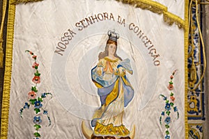 banner of Our Lady of Conception inside the Igreja Matriz de Colares Nossa Senhora da AssunÃ§Ã£o photo