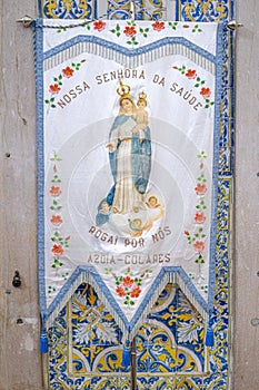 banner of Our Lady of Health inside the Igreja Matriz de Colares Nossa Senhora da AssunÃ§Ã£o photo