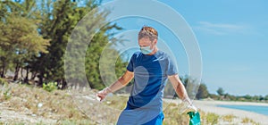 Banner paradise lazur blue sea sand beach in sunny day. Man in transparent gloves pick up plastic garbage. Problem photo