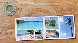 Banner Photobook Album with Travel Photo on Wooden Table background and Coffee or Tea in Cup