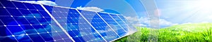 Banner of Solar Panels In Green Grass Landscape