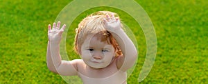 Banner with spring child face. Outdoor kids in diaper activities. Family summer holidays with children. Happy baby boy