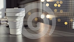 Banner with takeaway and eco-friendly coffee cup at cafe table. Time for drink coffee in city. Place for text
