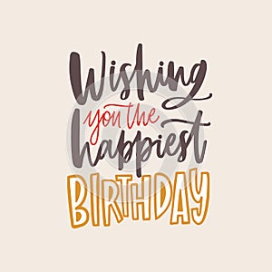 Banner template with Wishing You The Happiest Birthday phrase handwritten with elegant calligraphic cursive font on