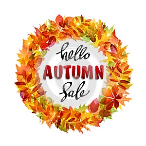 Banner with text hello autumn sale in the center of a wreath of