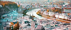 Banner travel with panoramic view in a Autumn season at a historic city of Salzburg with Salzach river in beautiful golden