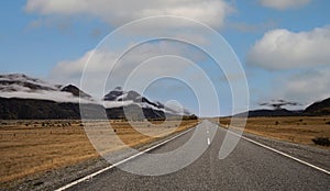 Banner of traveling  explore on the road with mountain range near Aoraki Mount Cook and the road leading to Mount Cook Village in