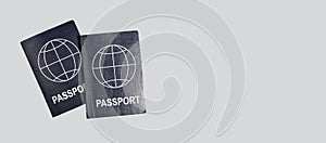 Banner with two abstract global passports on grey background. Joint vacation, travel together concept. Identity