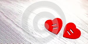 Banner. Two red felt hearts next to each other on a white wooden background. Valentine`s day. concept of love. Copy