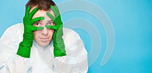 Banner view of scared man in protective suitt, medical mask and gloves against viruses and infections cover face by hand isolated