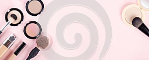 Banner of woman`s cosmetics on pink background.