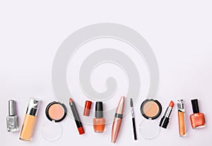 Banner of woman`s cosmetics on purple background.