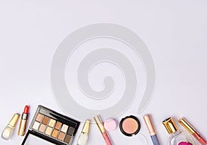 Banner of woman`s cosmetics on purple background.