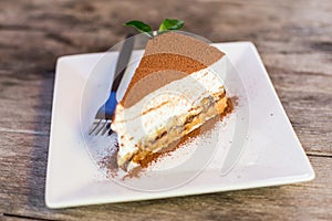 Banoffee cake on white dish.