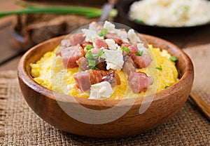 Banosh - Ukrainian Hutsul meal (maize porridge) with bacon photo