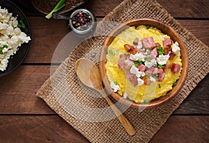 Banosh - Ukrainian Hutsul meal (maize porridge) with bacon photo