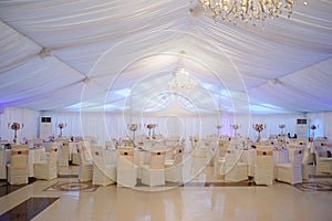 The banquet hall with round tables