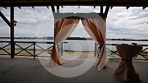 Banquet hall on the shores. Wedding ceremony on the shore.