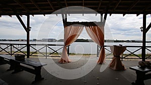 Banquet hall on the shores. Wedding ceremony on the shore.