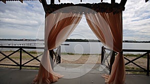 Banquet hall on the shores. Wedding ceremony on the shore.