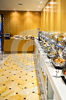 Banquet meals served on tables, food for group in restaurant.