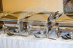 Banquet table with chafing dish heaters