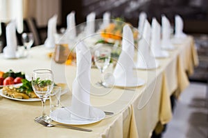 Banquet wedding table setting on evening reception