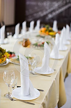 Banquet wedding table setting on evening reception