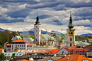 Banska Bystrica town during spring with Low Tatras mountains on horizon