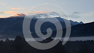 Bansko, Bulgaria. Snow mountain peaks at sunrise