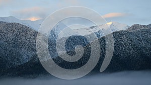 Bansko, Bulgaria. Snow mountain peaks at sunrise