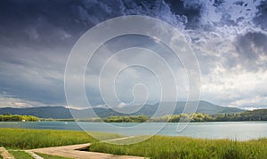 Banyoles lake under stormy clouds