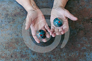 Adult woman hands excercising for stress with chinese baoding balls