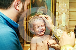 The baptism of a boy in the Orthodox Church