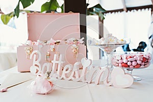 Baptism Celebration Table with Sweets and Decorations