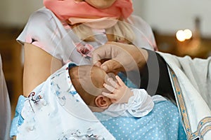 Baptism ceremony in Church, sanctification by the priest`s hand on the head. set