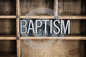 Baptism Concept Metal Letterpress Word in Drawer photo