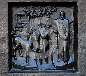 The Baptism of the Eunuch, relief on the door of the Grossmunster church in Zurich