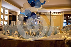 Baptism favors with decoration in the restaurant