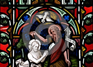 The baptism of Jesus Christ in stained glass