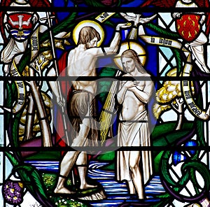 The baptism of Jesus in stained glass