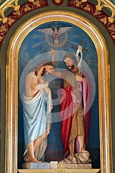 Baptism of the Lord, the main altar in St. John the Baptist Church in Sveti Ivan Zabno, Croatia photo