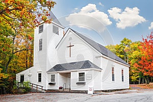 Baptist church surrounded by beautiful autumn colors