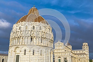 Baptistery, Cathedral and the Pisa Leaning tower in the famous Pisa`s Cathedral Square, Square of Miracles Piazza dei Miracoli