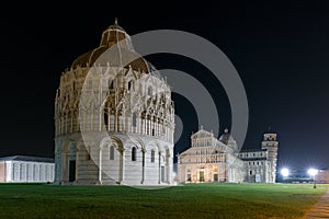 Baptistry, cathedral and leaning tower of Pisa at night