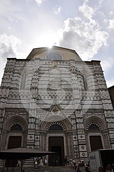 Baptistry of San Giovanni Battista Building from Downtown of Siena Medieval City. Tuscany. Italy