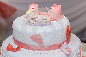 Baptize cake with sugar shoes