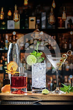 Bar with 3 Cocktails on Wood surface